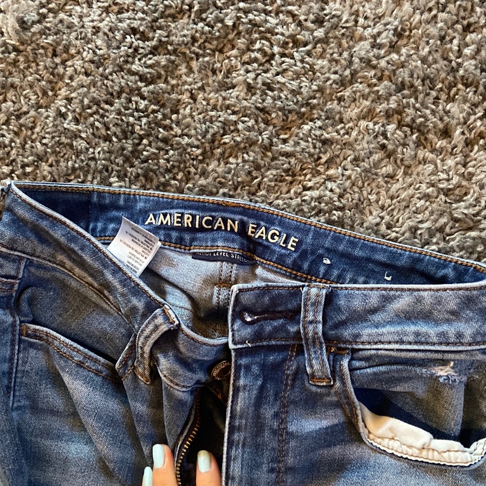 American eagle medium wash jeans with holes